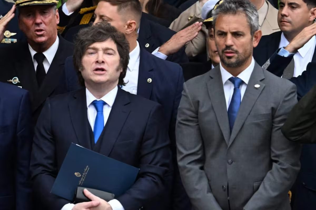 Num clima tenso, Millais tenta acalmar o governo interno e força reuniões para o reencontro Menem-Caputo.